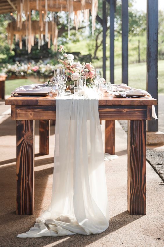 chiffon runner adds a touch of glam to this rustic table scape