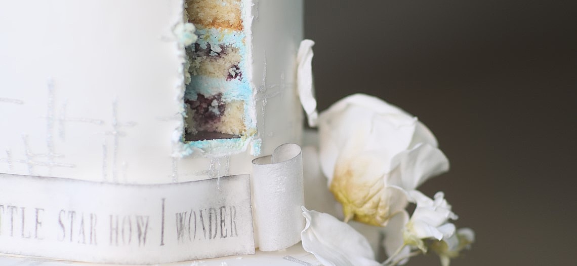 A Gender Reveal  Adorned with Baby's Breath
