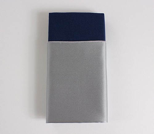 Silver Lamour Dinner Napkin with Navy Cotton Backing